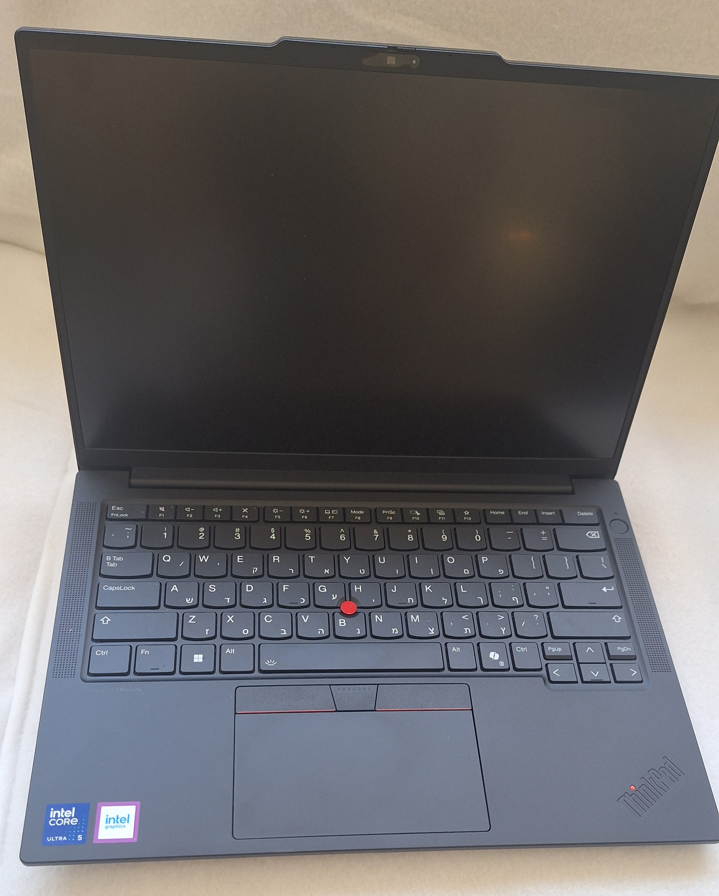 A Lenovo ThinkPad E14 laptop, open, viewed from above